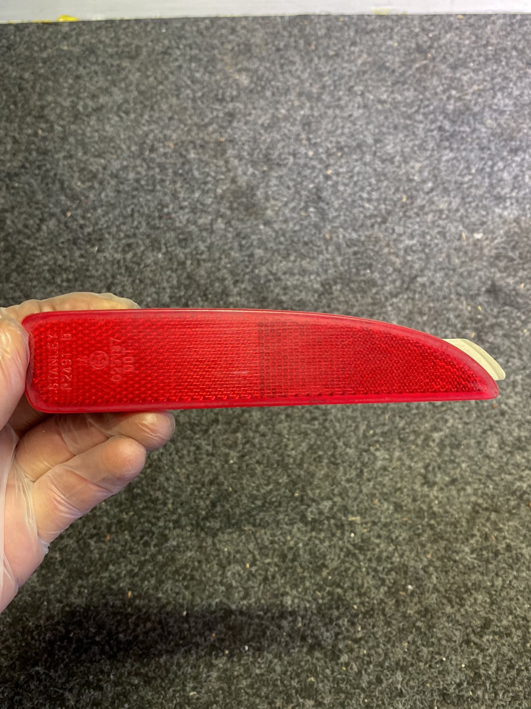 2006 Mazda Axela - Left Rear Bumper Reflector PN: STANLEY P2491 B