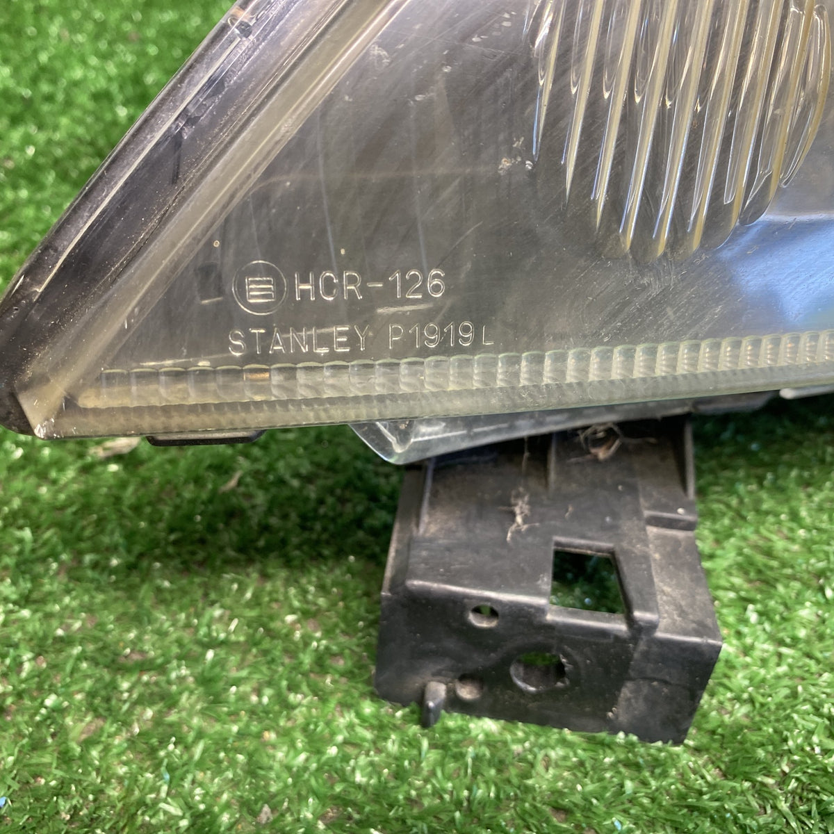 2002 Mazda Demio - Left Headlight PN: STANLEY P1919