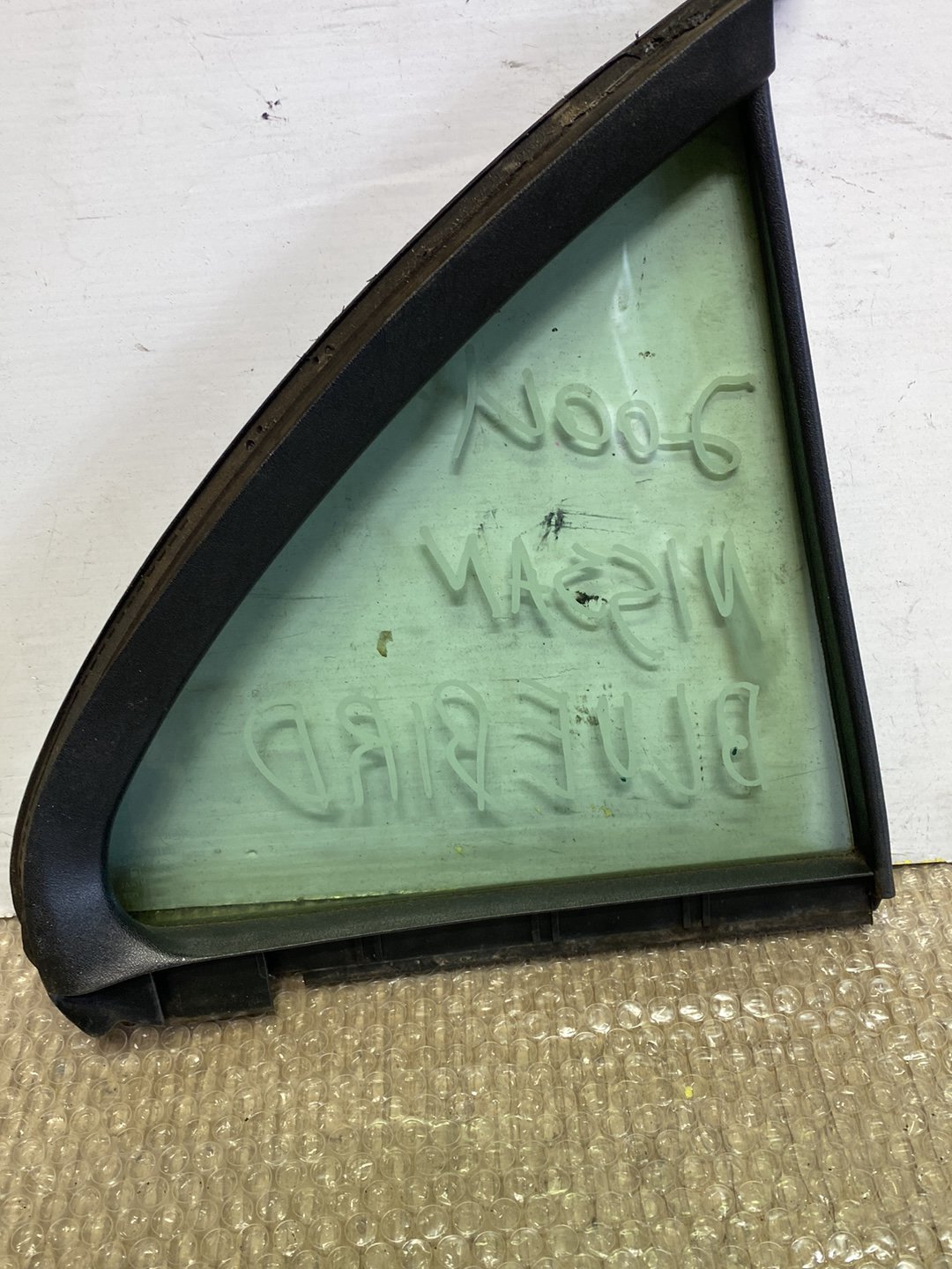 2004 Nissan Bluebird- Left Rear Quarter Door Glass PN: M2E2