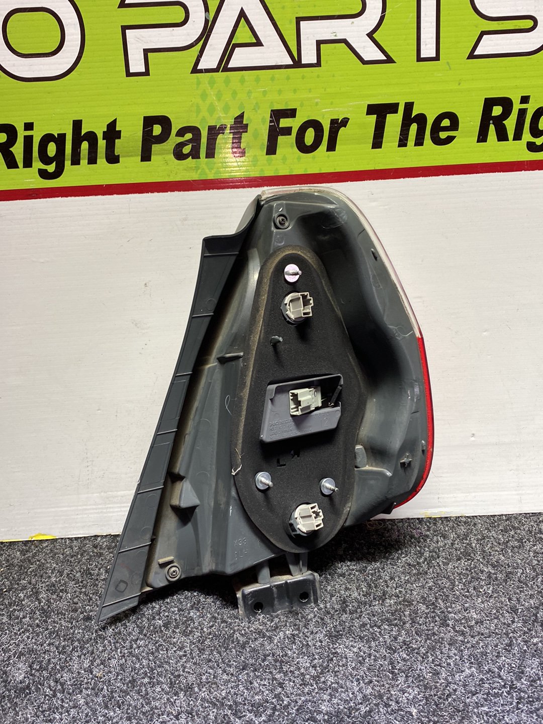 2005 Honda Fit - Left Taillight PN: ICHIKOH 4995