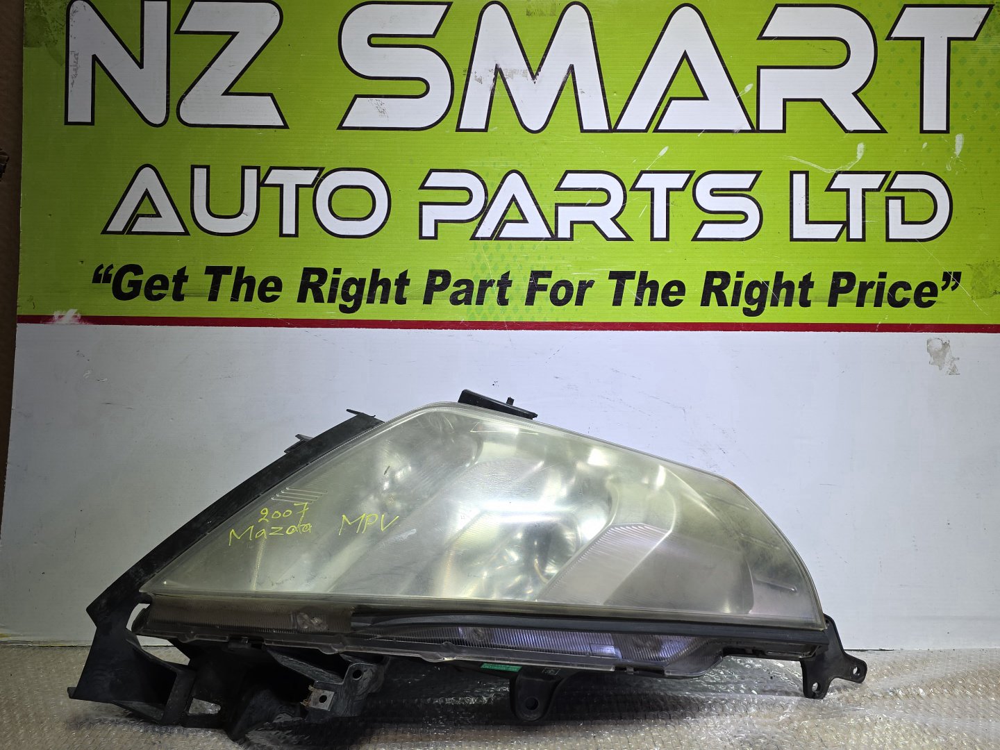 2007 Mazda MPV- Right Headlight PN: