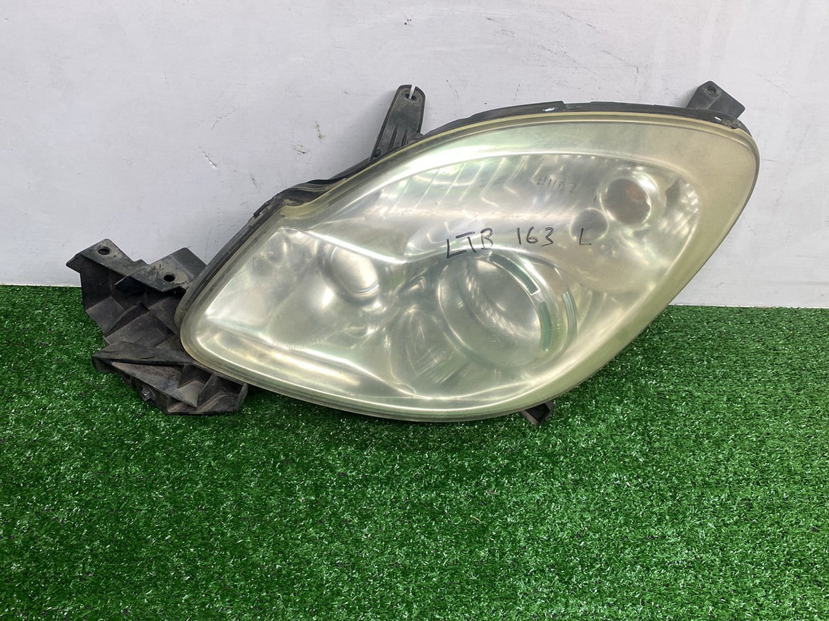 2007 Mazda Verisa - Left Headlight PN: D673510L0