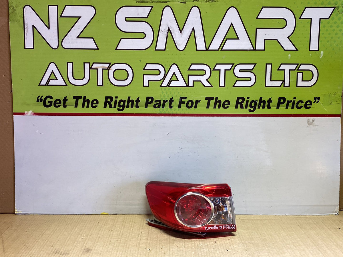 2010 Used Toyota Corolla - Left Taillight PN: Koito 12-566