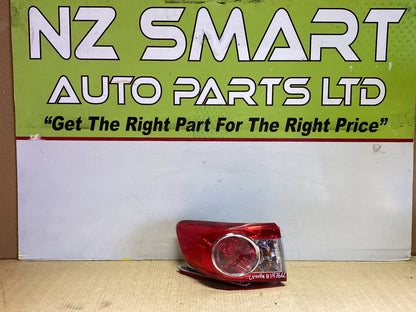 2010 Used Toyota Corolla - Left Taillight PN: Koito 12-566
