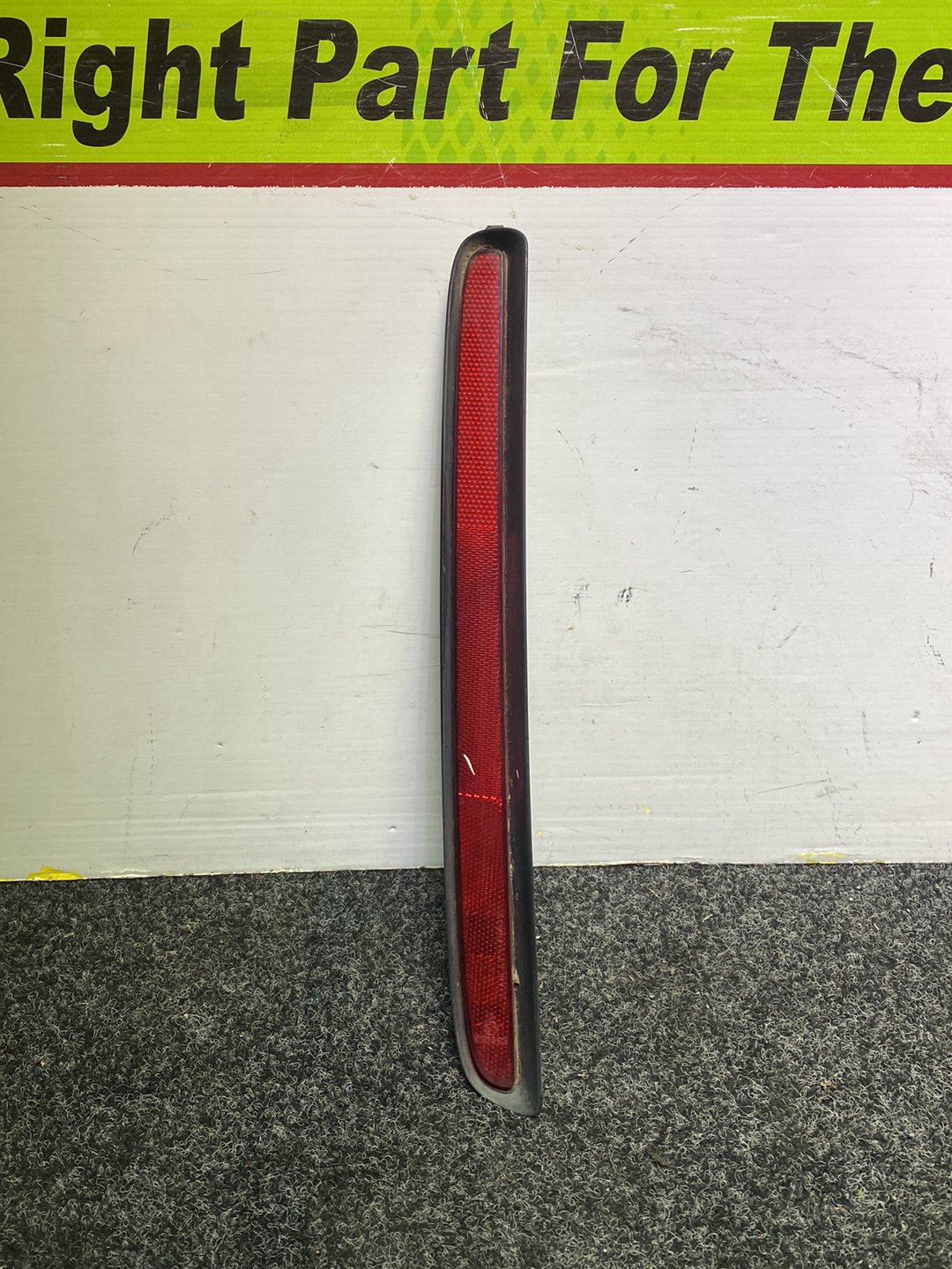 2010 Mazda Biante - Left Rear Bumper Reflector PN: STANLEY P7943 L