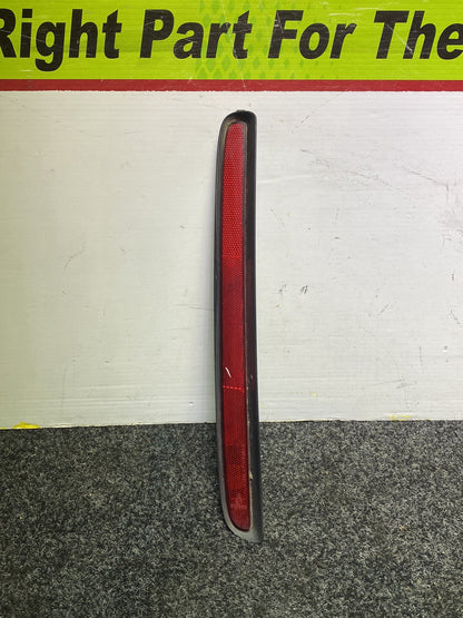 2010 Mazda Biante - Left Rear Bumper Reflector PN: STANLEY P7943 L