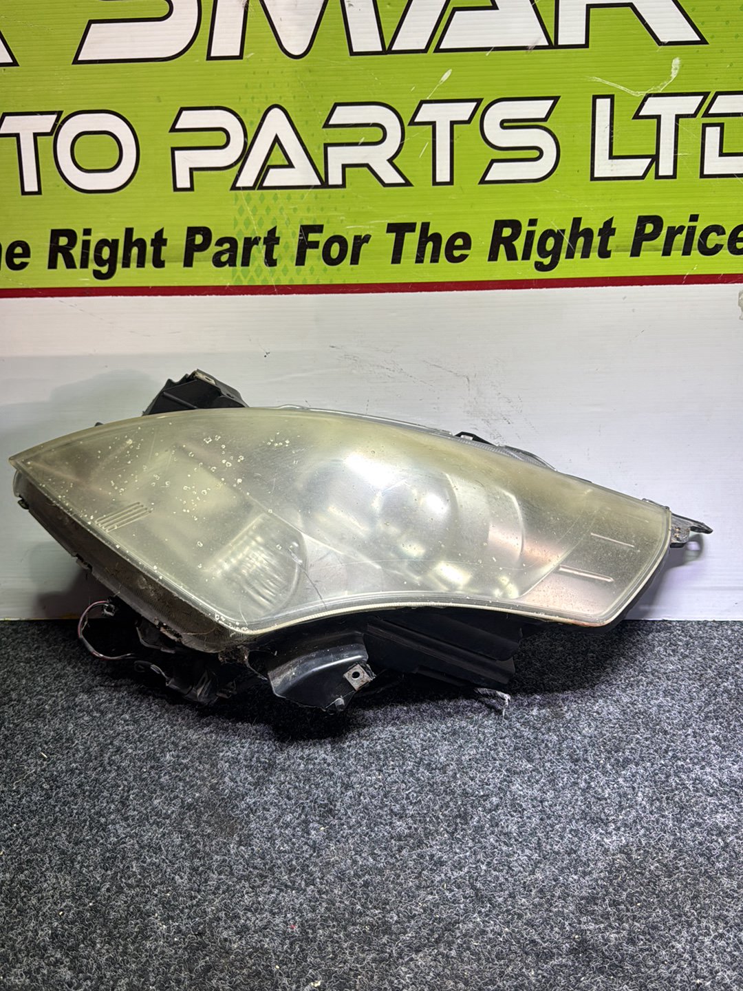 2007 Mazda MPV- Left Headlight PN: STANLEY P5620