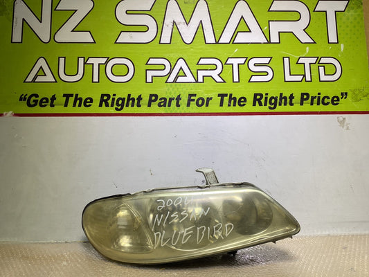 2004 Nissan Bluebird - Right Headlight PN: Manual Adjust/ Non Hid/ ICHIKOH 1723
