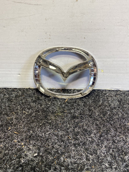 2005 Mazda RX-8 - Bumper Grille Badge