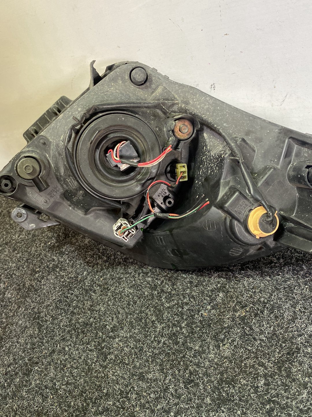 2004 Suzuki Swift - Left Headlight PN: STANLEY P4432L