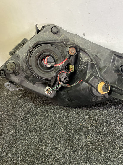 2004 Suzuki Swift - Left Headlight PN: STANLEY P4432L