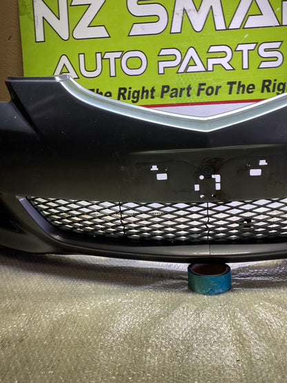 2005 Mazda Axela- Front Bumper PN: see photos