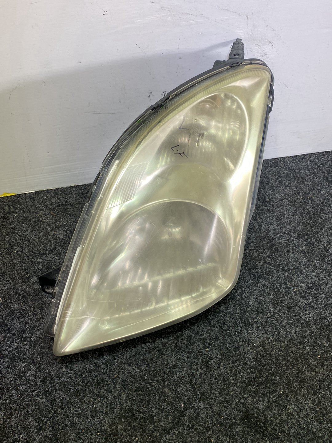 2004 Suzuki Swift - Left Headlight PN: STANLEY P4432L