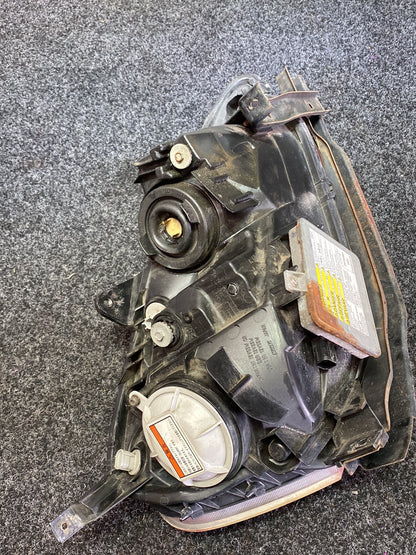 2004 Honda Integra- Left Headlight PN: 100-22392