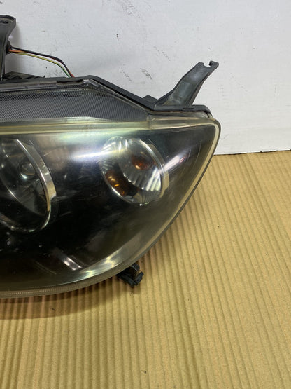 2005 Mazda Demio- Left Headlight PN: STANLEY P2632