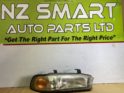 1997 Subaru Legacy- Right Headlight PN: see photos