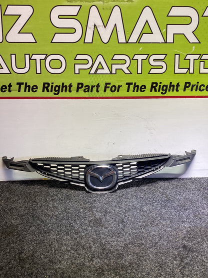 2010 Mazda Demio - Upper Bumper Grille PN: D65150710