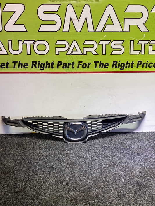 2010 Mazda Demio - Upper Bumper Grille PN: D65150710