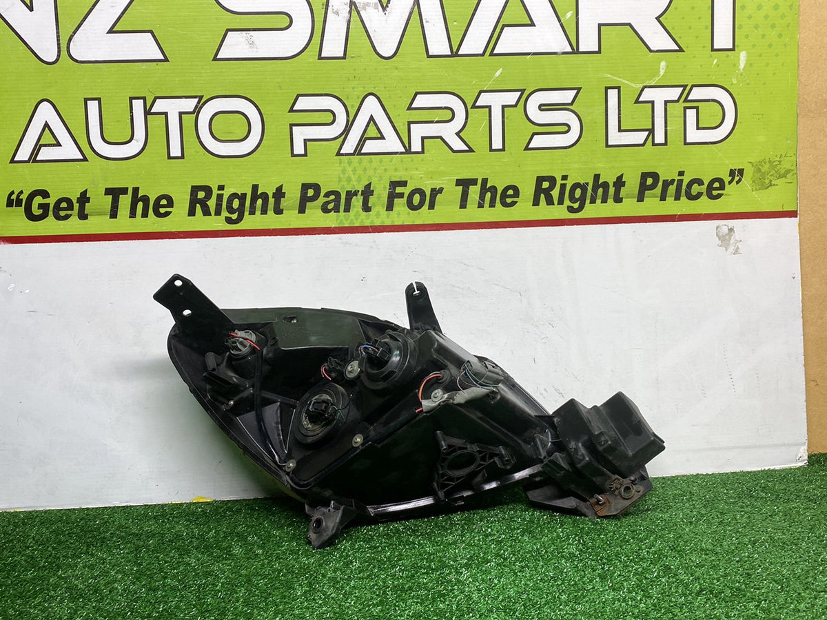 2007 Mazda Verisa - Left Headlight PN: D673510L0
