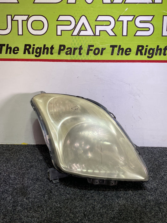 2004 Suzuki Swift - Right Headlight PN: STANLEY P4432R