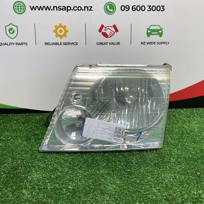 2004 Ford Explorer - Left Headlight PN: 1L2Z13008AB