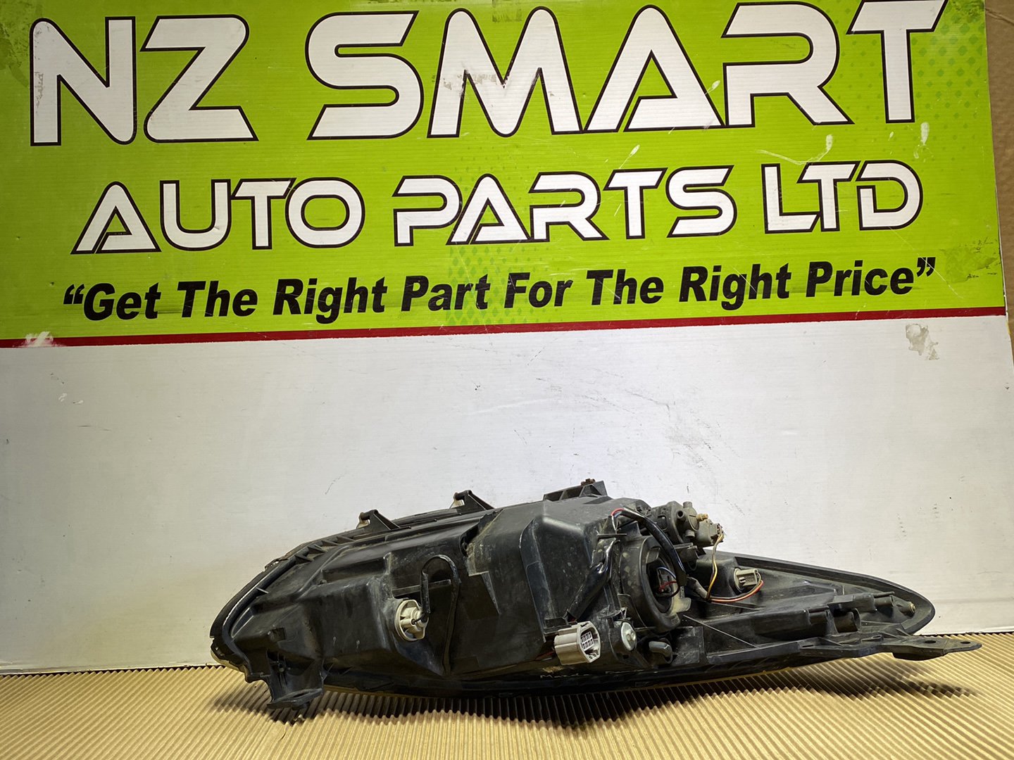 2009 Mazda Demio- Left Headlight PN: STANLEY 907-38200