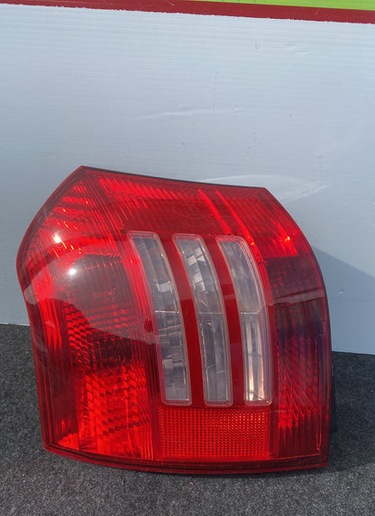 2004 Used Toyota Corolla Runx ZZE122 - Left Taillight PN: Koito 13-77