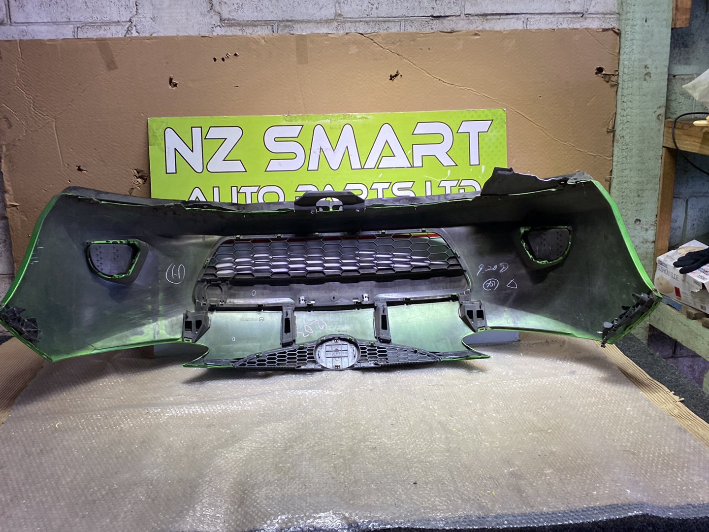 2010 Mazda Demio- Front Bumper PN: see photos
