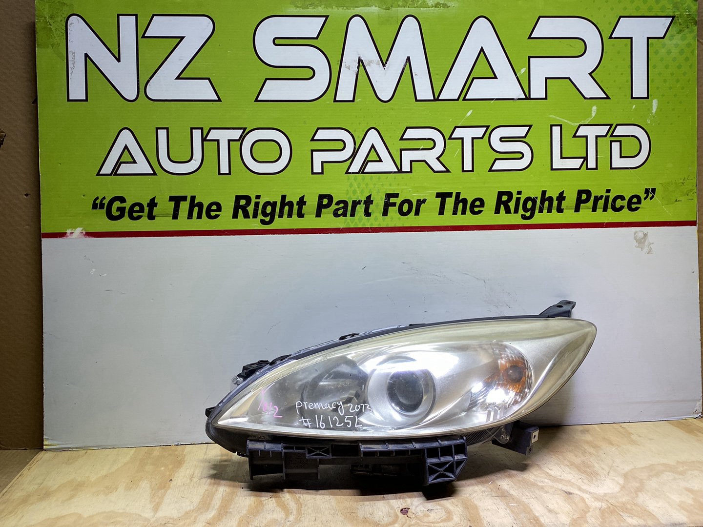 2013 Mazda Premacy CWFFW - Left Headlight PN: P9566