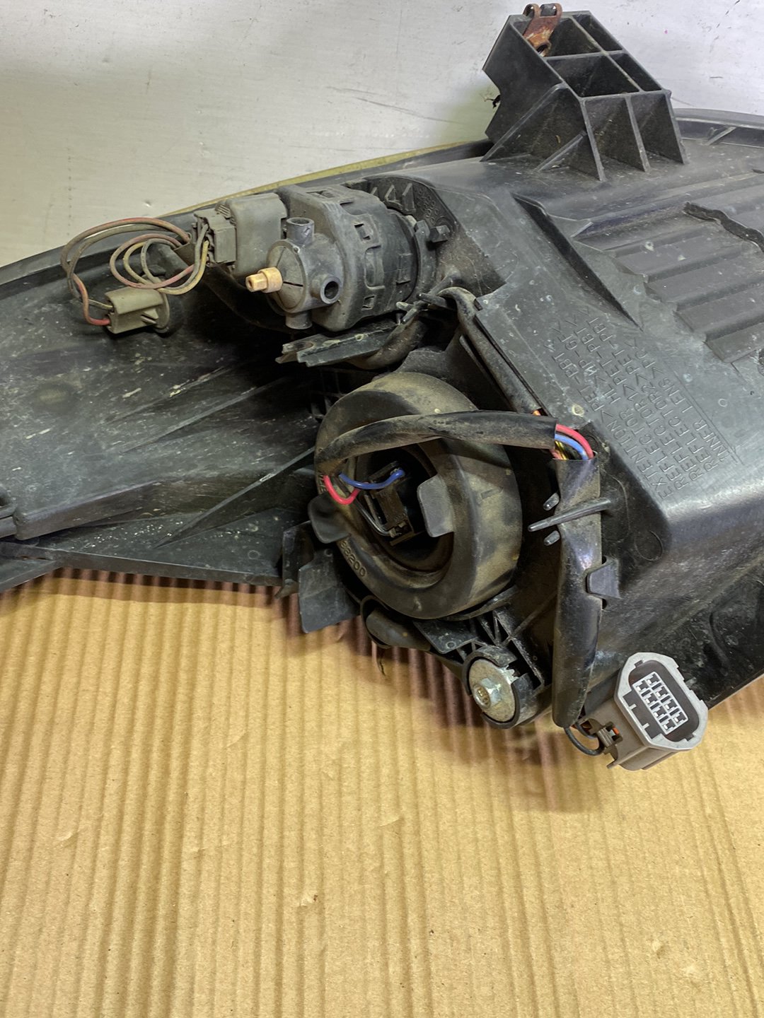 2009 Mazda Demio- Right Headlight PN: STANLEY P654/P7217