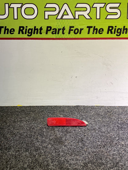 2006 Mazda Axela - Left Rear Bumper Reflector PN: STANLEY P2491 B