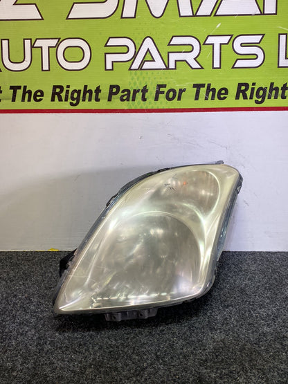 2004 Suzuki Swift - Left Headlight PN: STANLEY P4432L