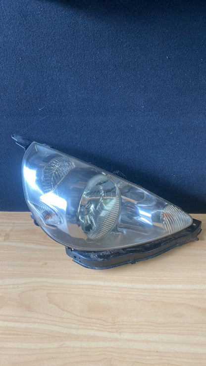 2004 Honda Fit - Right Headlight PN: P3448 H.I.D chrome inner