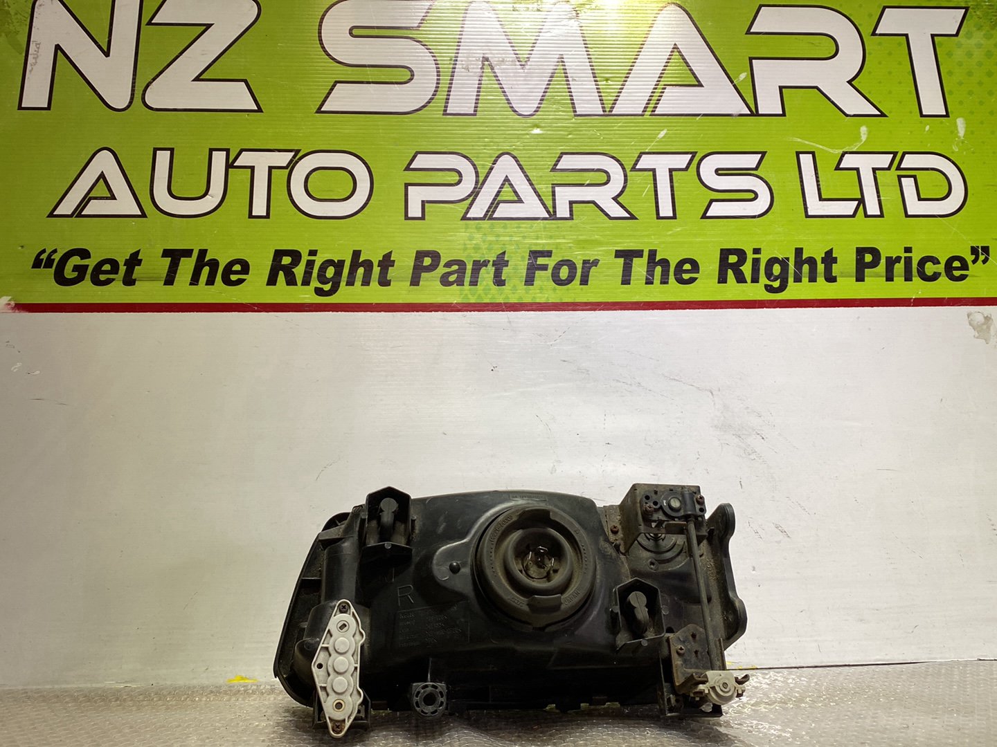 2003 Mitsubishi L300- Right Headlight PN: see photos