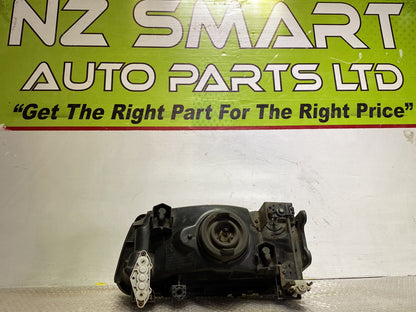 2003 Mitsubishi L300- Right Headlight PN: see photos