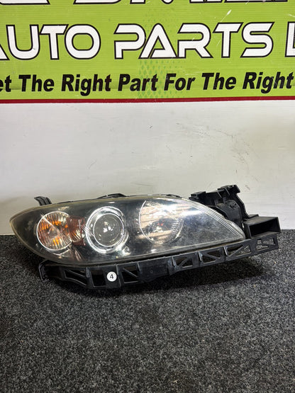 2006 Mazda Axela - Right Headlight PN: STANLEY P2690