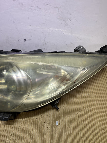 2010 Mazda Axela- Left Headlight PN: see photos