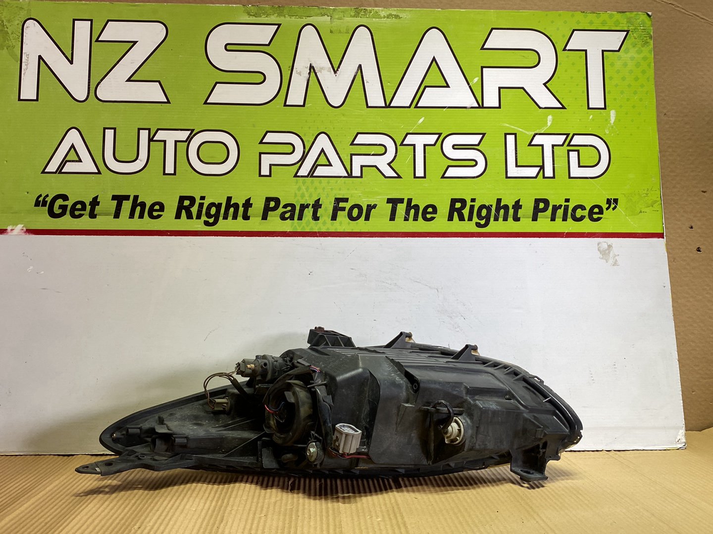 2009 Mazda Demio- Right Headlight PN: STANLEY P654/P7217