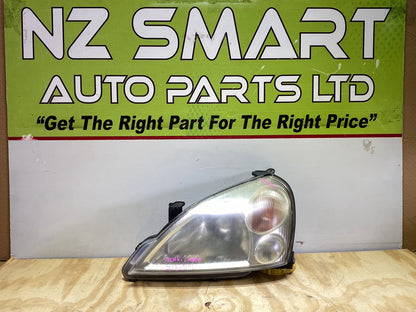 2004 Suzuki Liana - Left Headlight PN: Koito 100-32662