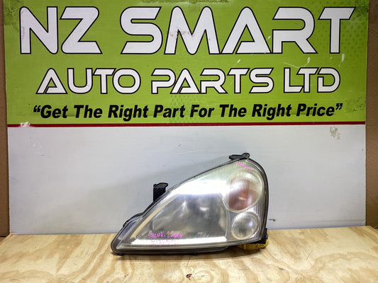 2004 Suzuki Liana - Left Headlight PN: Koito 100-32662