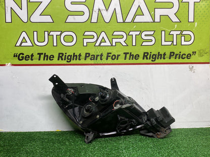 2007 Mazda Verisa - Left Headlight PN: D673510L0