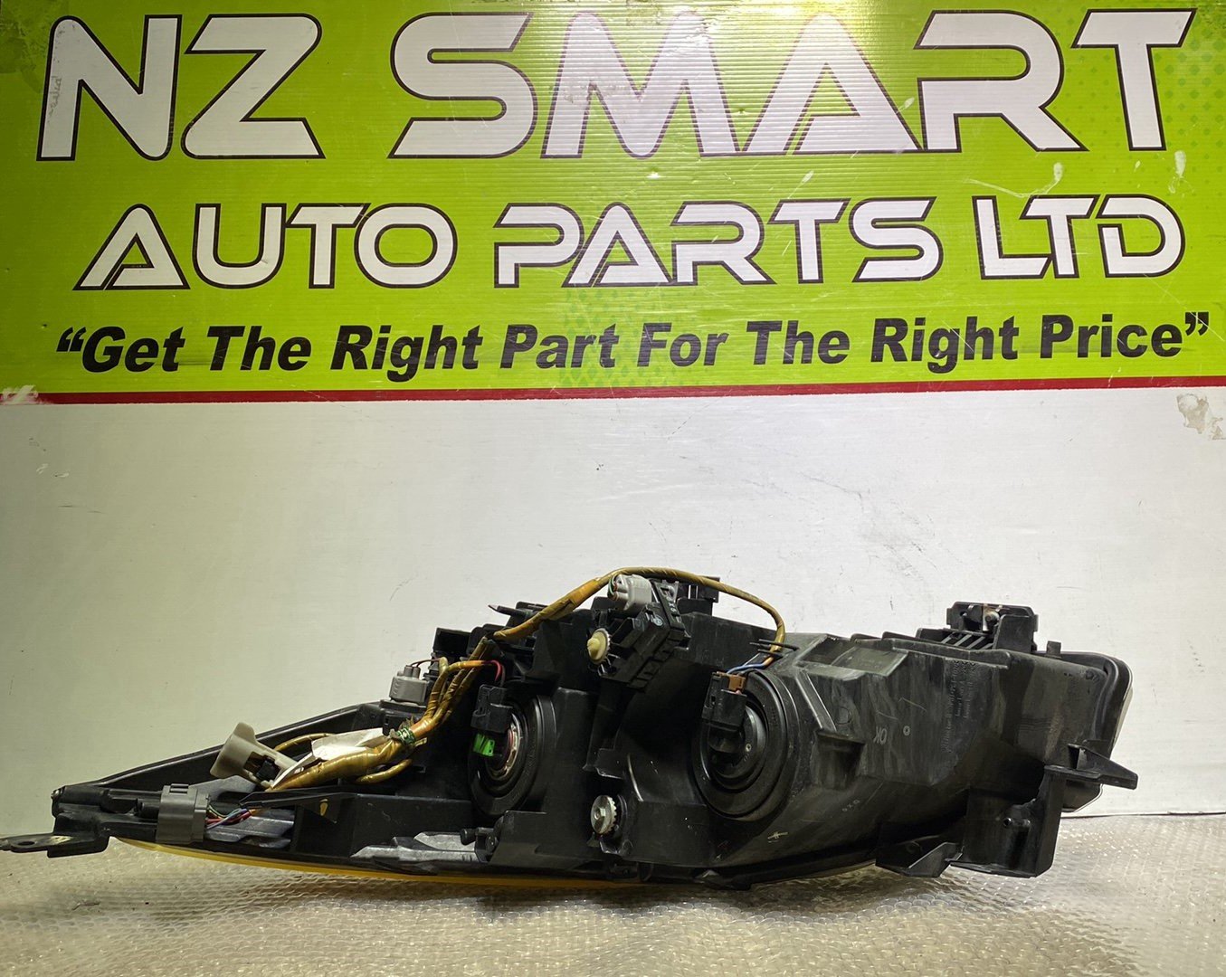 2010 Mazda Axela- Right Headlight PN: see photos