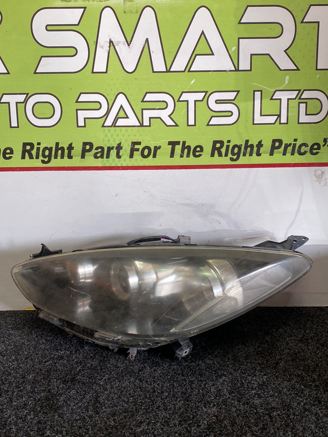 2008 Mazda Demio- Right Headlight PN: