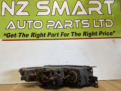 2002 Mitsubishi Galant- Right Headlight PN: STANLEY 907-37000