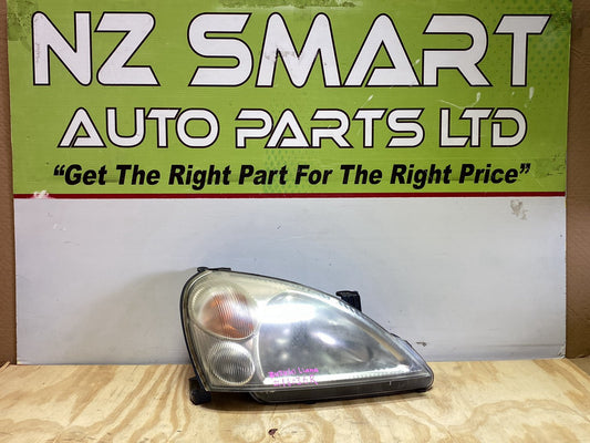 2004 Suzuki Liana - Right Headlight PN: Koito 100-32662