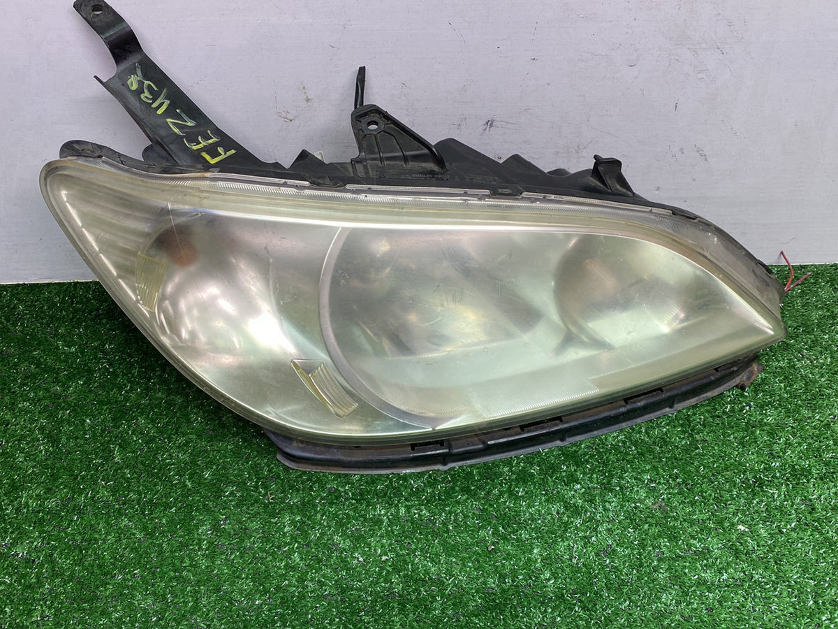 2004 Honda Civic - Right Headlight PN: STANLEY 8519806800