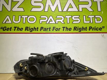 2013 Ford Focus- Left Headlight PN: see photos