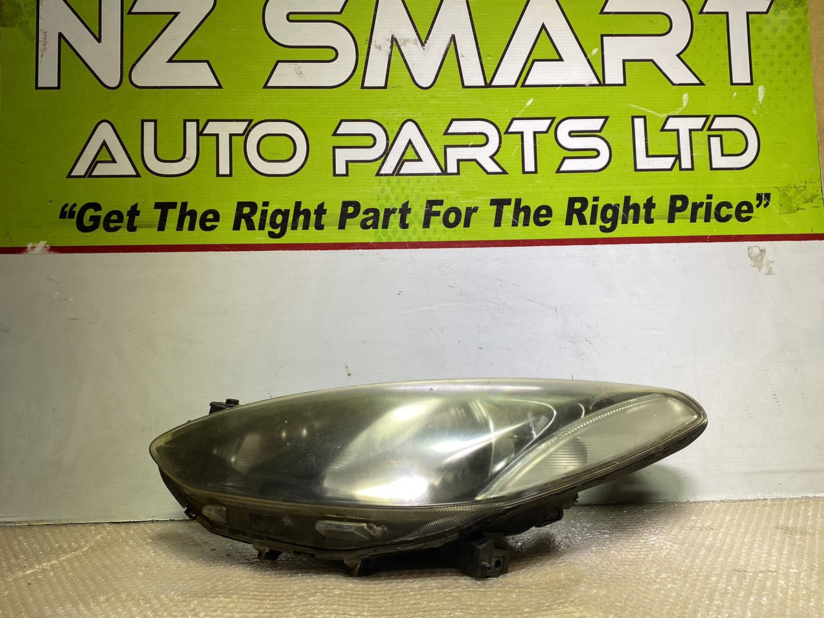 2009 Mazda Demio - Left Headlight PN: see photos
