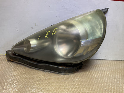 2005 Honda Fit - Left Headlight PN: see photos