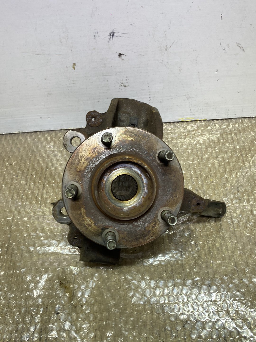 2006 Mazda Axela- Left Front Steering Knuckle PN: see photos